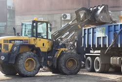 Skip Hire Harlow loading a lorry for transfer